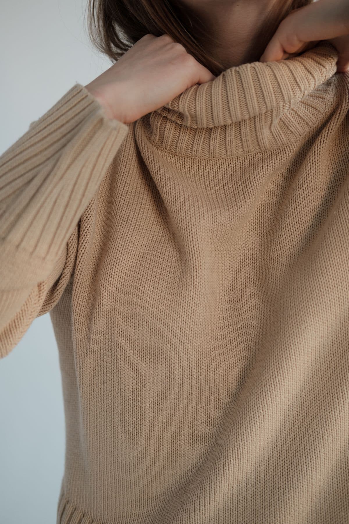 Pull col roulé en maille torsadée